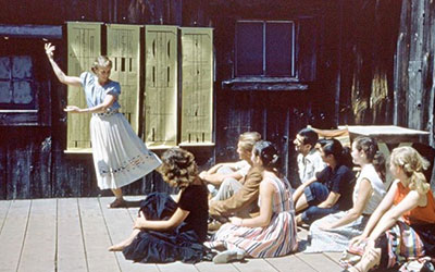 photo of Ann Hutchinson Guest teaching and demonstrating outdoors at Jacob's Pillow